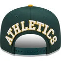 mutzen-flach-grun-snapback-9fifty-team-arch-der-oakland-athletics-mlb-von-new-era