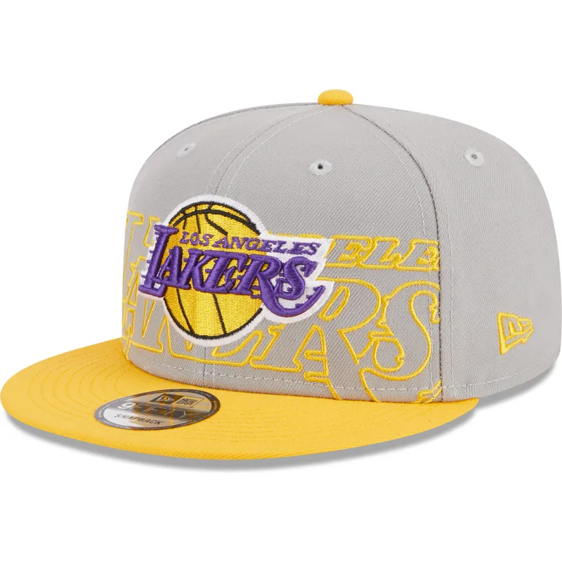 mutzen-flach-grau-snapback-9fifty-draft-edition-2023-der-los-angeles-lakers-nba-von-new-era