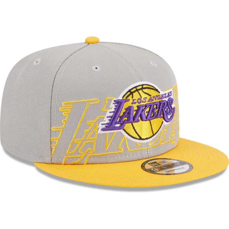 mutzen-flach-grau-snapback-9fifty-draft-edition-2023-der-los-angeles-lakers-nba-von-new-era