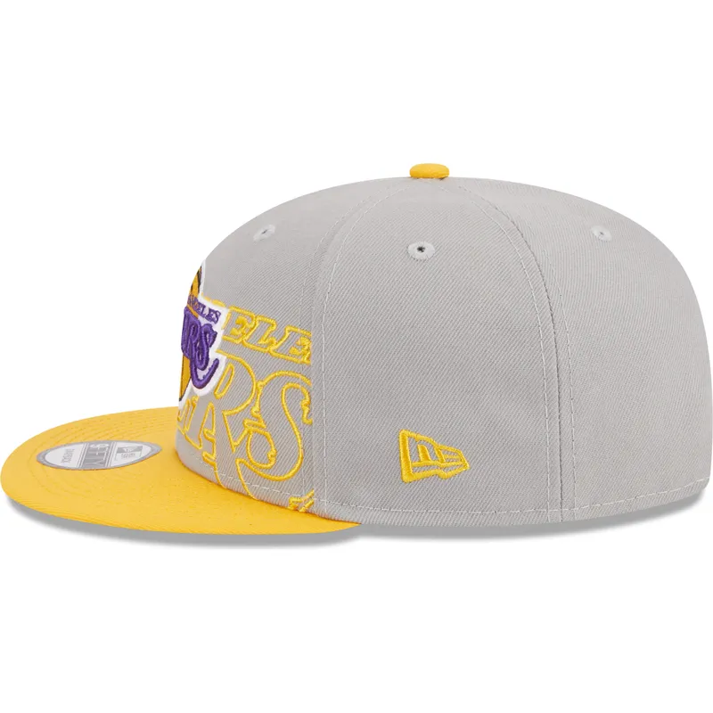 mutzen-flach-grau-snapback-9fifty-draft-edition-2023-der-los-angeles-lakers-nba-von-new-era