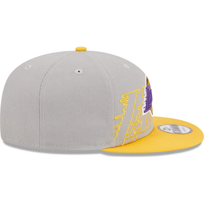 mutzen-flach-grau-snapback-9fifty-draft-edition-2023-der-los-angeles-lakers-nba-von-new-era
