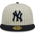 mutzen-flach-beige-angepasst-59fifty-retro-script-der-new-york-yankees-mlb-von-new-era