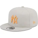 mutzen-flach-beige-snapback-9fifty-side-patch-der-new-york-yankees-mlb-von-new-era