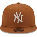 new-era-9fifty-league-essential-snapback-kappe-in-braun-der-new-york-yankees-mlb
