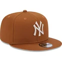 new-era-9fifty-league-essential-snapback-kappe-in-braun-der-new-york-yankees-mlb