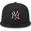 schwarze-snapback-kappe-mit-flachem-schirm-und-braunem-logo-9fifty-seasonal-infill-der-new-york-yankees-mlb-von-new-era