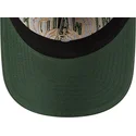 graue-und-grune-verstellbare-curved-cap-9twenty-tip-off-2023-der-milwaukee-bucks-nba-von-new-era
