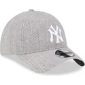 verstellbare-graue-9twenty-kappe-mit-gebogenem-schirm-im-fischgratenmuster-der-new-york-yankees-mlb-von-new-era