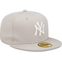 beige-angepasste-59fifty-league-essential-flat-cap-der-new-york-yankees-mlb-von-new-era