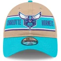 braune-und-blaue-verstellbare-curved-cap-9twenty-draft-2024-der-charlotte-hornets-nba-von-new-era