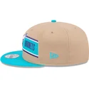 braune-und-blaue-snapback-kappe-9fifty-draft-2024-der-charlotte-hornets-nba-von-new-era