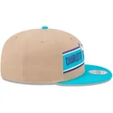 braune-und-blaue-snapback-kappe-9fifty-draft-2024-der-charlotte-hornets-nba-von-new-era