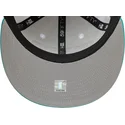 weisse-und-grune-anliegende-flat-cap-59fifty-classic-der-memphis-grizzlies-nba-von-new-era