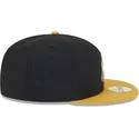 schwarze-und-gelbe-anliegende-flatcap-mit-goldenem-logo-59fifty-day-von-new-york-yankees-mlb-von-new-era