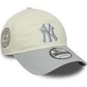 beige-und-graue-verstellbare-damenkappe-9twenty-world-series-cooperstown-new-york-yankees-mlb-von-new-era