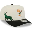 beige-und-schwarze-gebogene-snapback-kappe-9fifty-a-frame-precurved-hardwood-classics-der-milwaukee-bucks-nba-von-new-era