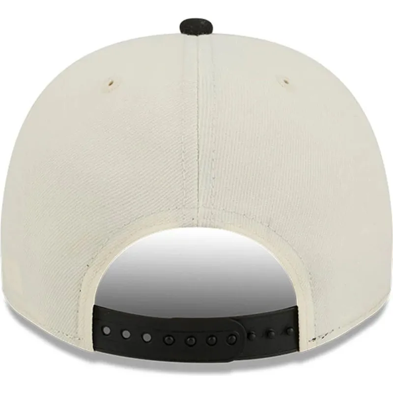 beige-und-schwarze-gebogene-snapback-kappe-9fifty-a-frame-precurved-hardwood-classics-der-toronto-raptors-nba-von-new-era