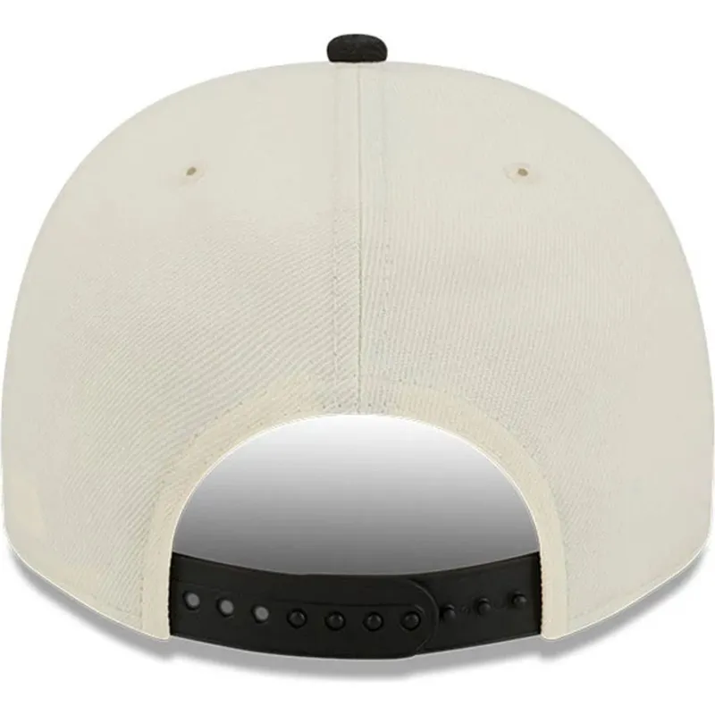 beige-und-schwarze-gebogene-snapback-kappe-9fifty-a-frame-precurved-hardwood-classics-der-vancouver-grizzlies-nba-von-new-era