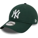 dunkelgrune-verstellbare-curved-cap-9twenty-league-essential-der-new-york-yankees-mlb-von-new-era