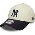 beige-und-marineblaue-verstellbare-curved-cap-mit-marineblauen-logo-9forty-world-series-der-new-york-yankees-mlb-von-new-era