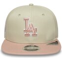 beige-snapback-flatcap-mit-rosa-logo-9fifty-original-fit-world-series-patch-der-los-angeles-dodgers-mlb-von-new-era